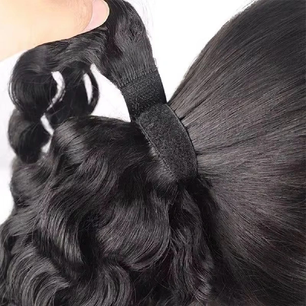Straight human-hair ponytail with clip in Natural Black